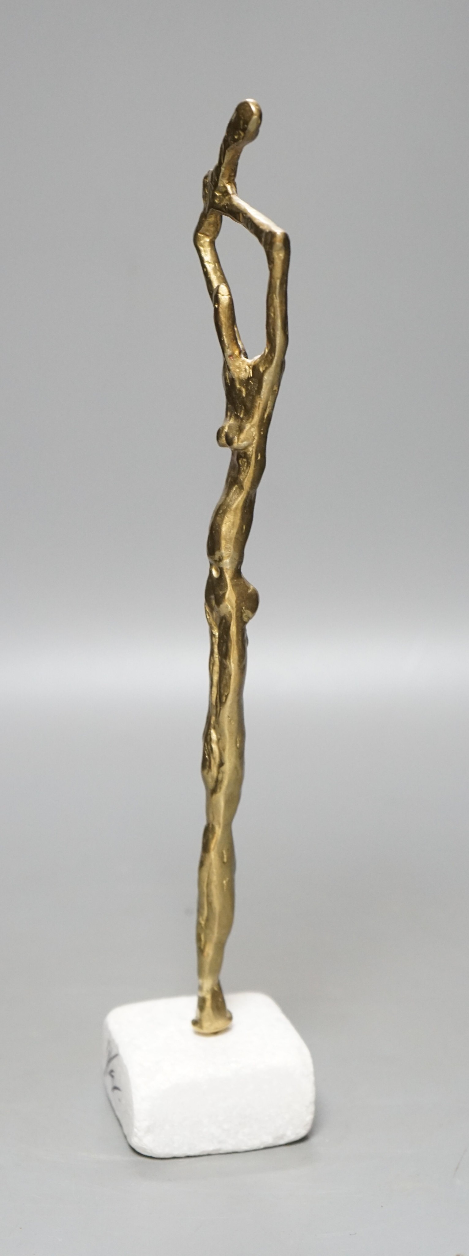 After Giacometti, an abstract bronze figure 33cm